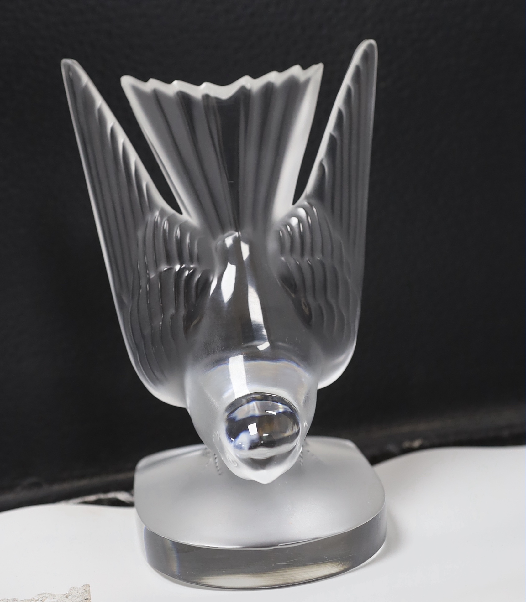 A Lalique Hirondelle bookend and two dishes with leaf design to rims, swallow height 15.8cm (3)